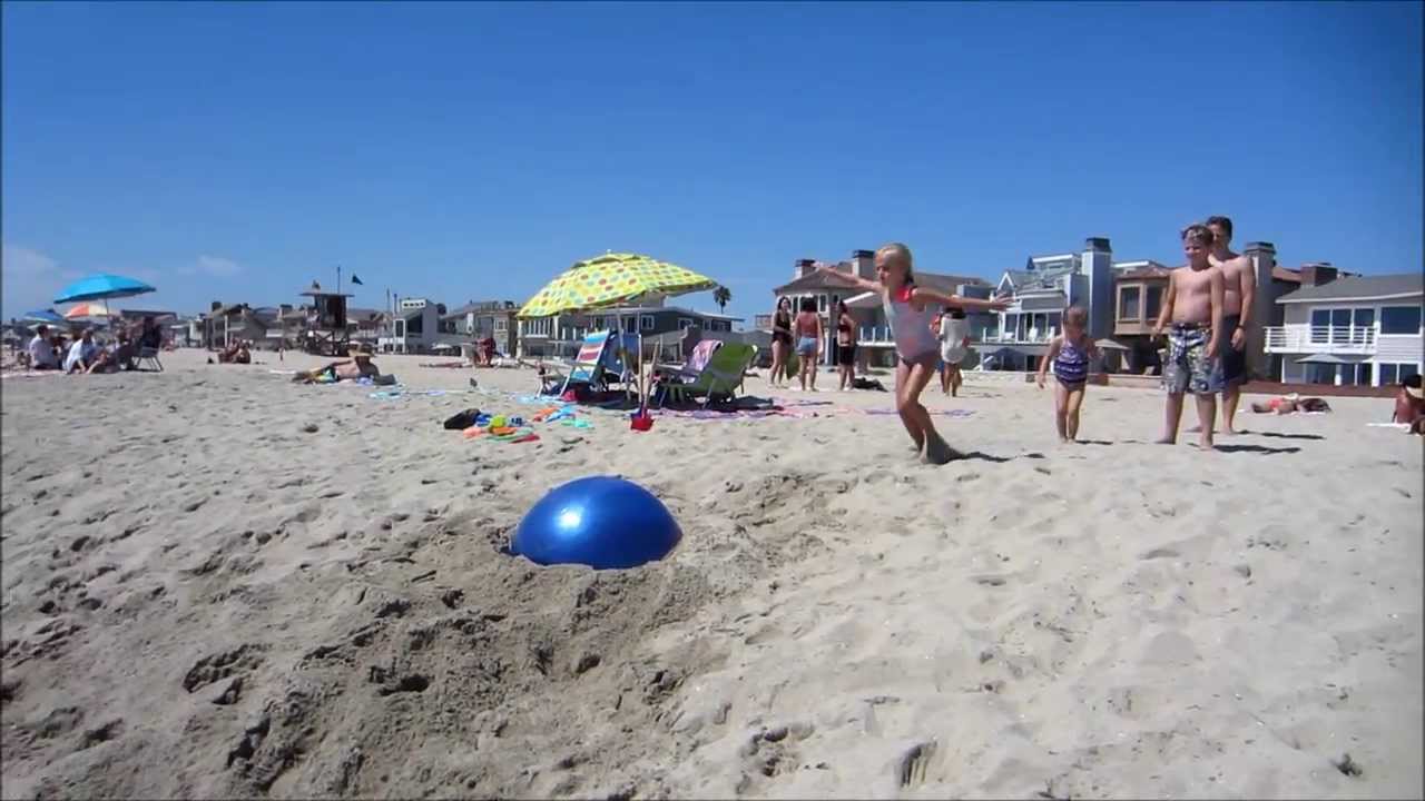 Family Going Flipping Ballistic the Beach with a Yoga Ball YouTube