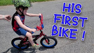 His First Bike! Harrison gets a Spider-Man bike!