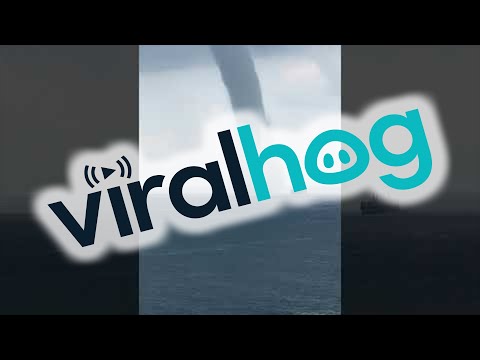 Waterspout Passes Over Ship in Singapore || ViralHog