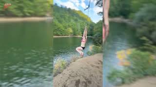 Woman Falls Into Water During Rope Swing - 1849439