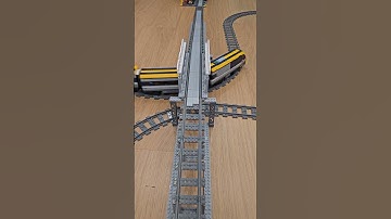 LEGO trains on two-level layout - long freight and bridge run
