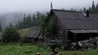 hiding in an abandoned log cabin from the rain , make cozy place to overnight