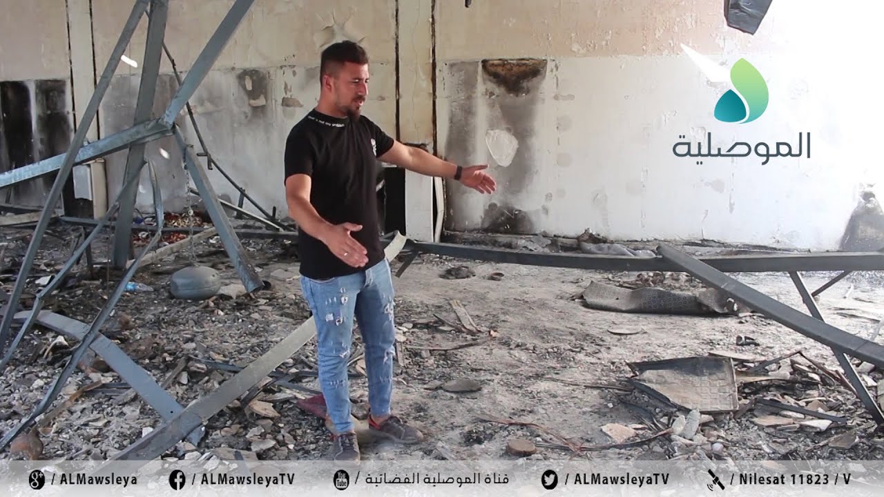 ناجون من حريق الحمدانية يزورون موقع الحادثة ويشعلون الشموع تخليدا لاروح المتوفين