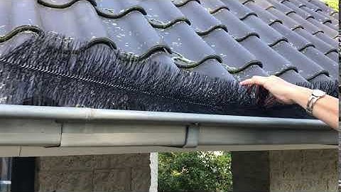 Hoe leg ik dakgootborstels in de dakgoot om verstoppingen te voorkomen?