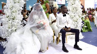 Watch Musician Akwaboah & his beautiful bride arrive to seal their love with their white wedding.