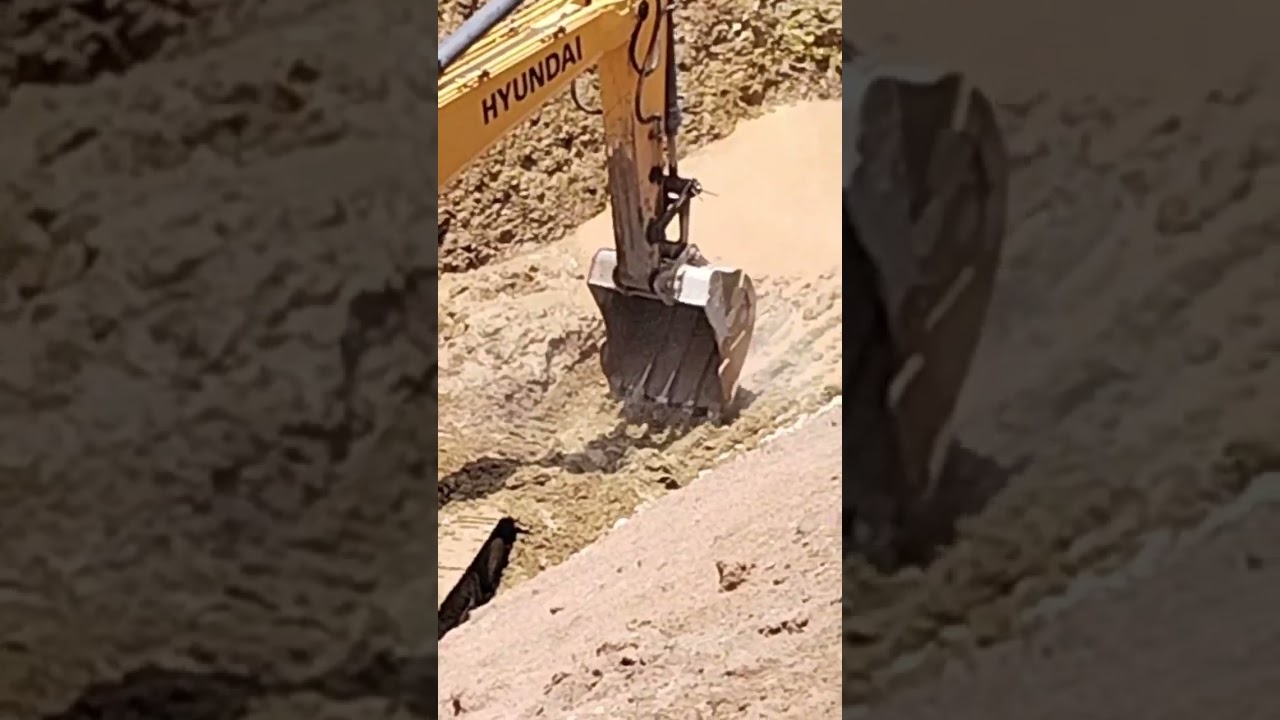 Hard material Excavation In Cut off trench .