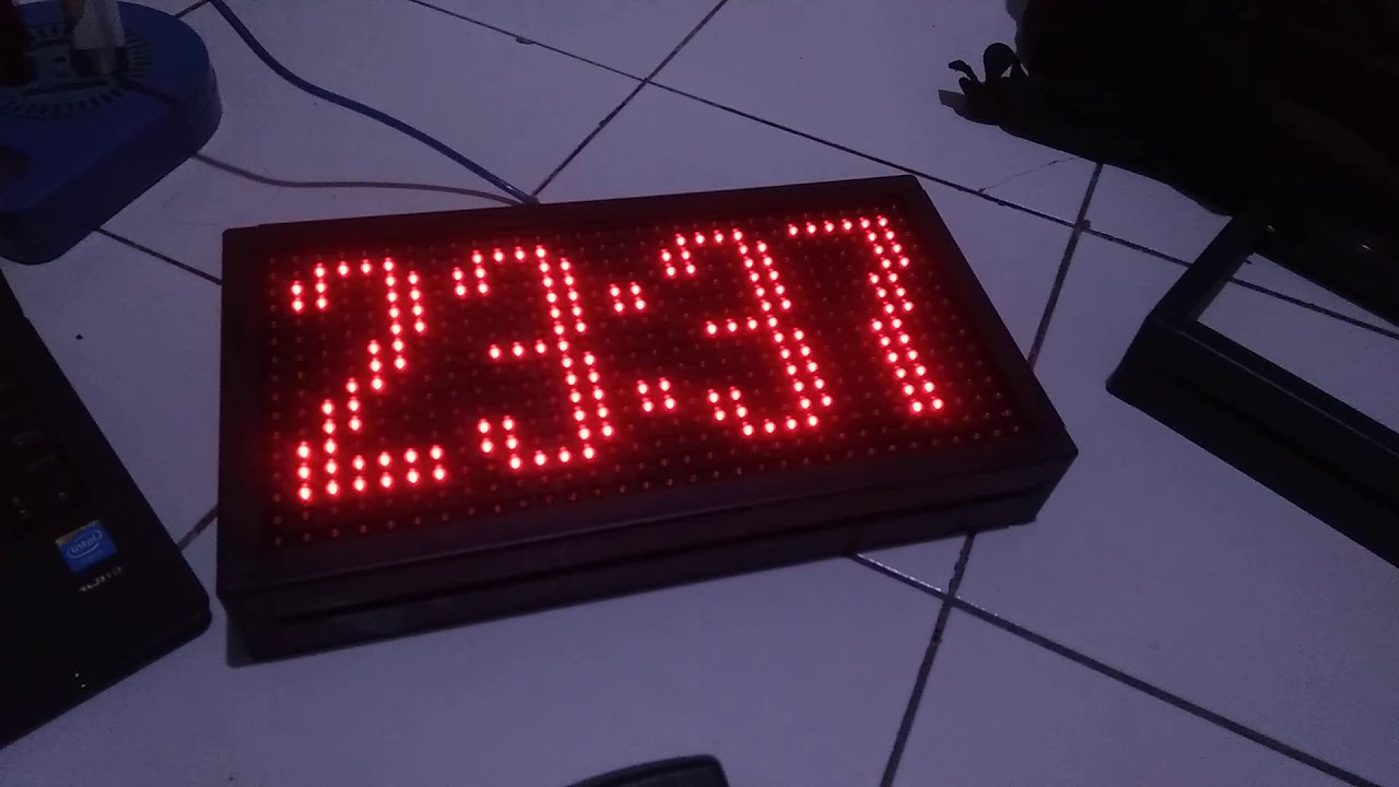 JAM DIGITAL RUNNING TEXT MERAH 16X32cm