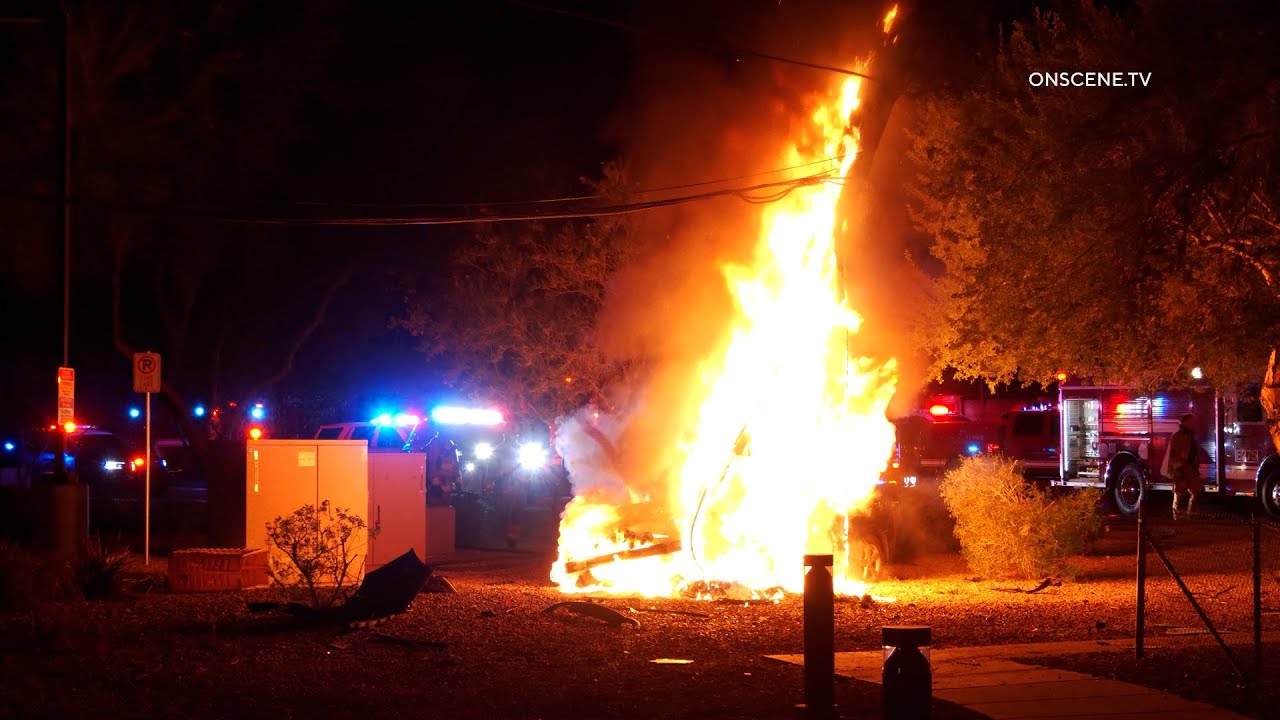 Car Erupts Into Flames After Crashing Into Power Pole - YouTube