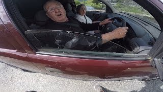 Local angry man and woman block traffic // ROAD RAGE