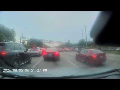 Dashcam Captures Florida Man Doing Something NO Driver Should Attempt