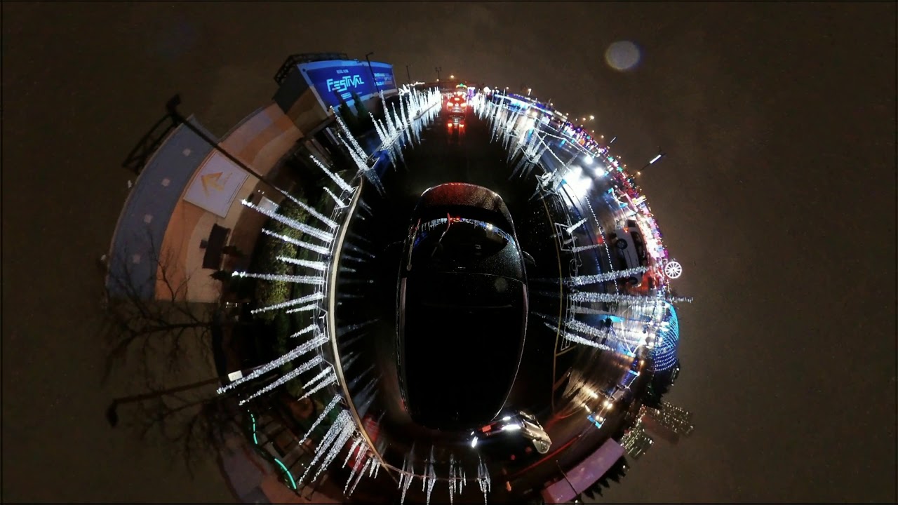 Black car & freezing rain in the Nights of Lights.  4k 360