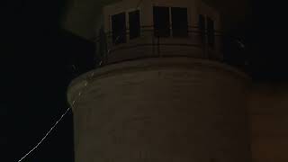 Canada's notorious Kingston Penitentiary peaking around at night time