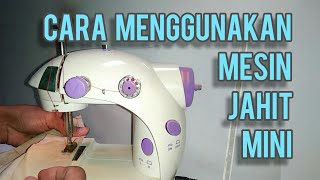 Mengoperasikan mesin jahit mini SM-202