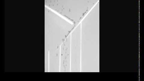 Optoelectronic tweezer for particle separation in microfluidics