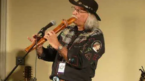 Flute Player at the Powwow by Powwow Poet