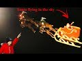 Санта Клаус летит на санях по небу/Santa Claus flying in the sky