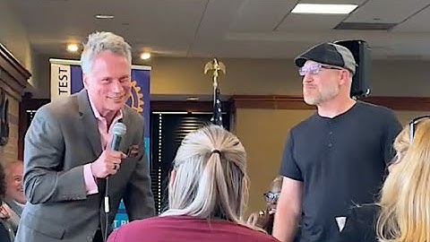 Michael Angelo Caruso shows Michigan police officer how to work a room