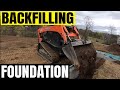 Backfilling  compacting foundation dirt boss