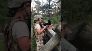 Female soldier misfires grenade launcher