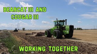 Steiger Cougar III and Bearcat III simultaneously disking a field