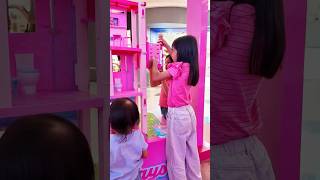Barbie and Ken Take the Pink Dollhouse Elevator