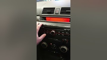 How to adjust time on Mazda 3 clock