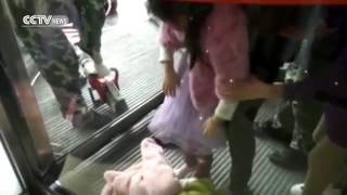 27619 Governance 011 Cctv Footage Rescuing 4 Year Old Who Got Foot Caught In Revolving Door