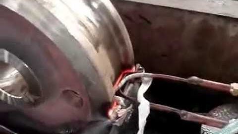 Wheel hardening by induction heating machine