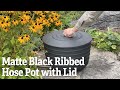 A closer look at the matte black ribbed hose pot with lid  gardeners supply