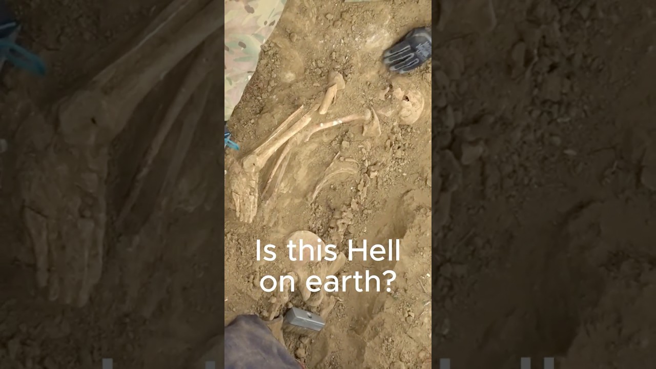 Rosary found in German mass grave - WWII exhumations