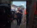 NVIDIA CEO Jensen Huang accepts a gift from a Woman in China Despite His Bodyguard Refusing