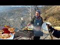 Happy old age of an elderly couple in a mountain village far from civilization