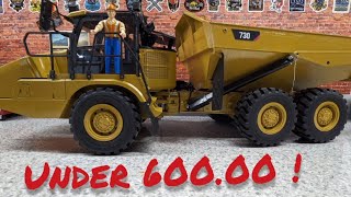 1/14 scale articulating cat dump truck for under 600.00!