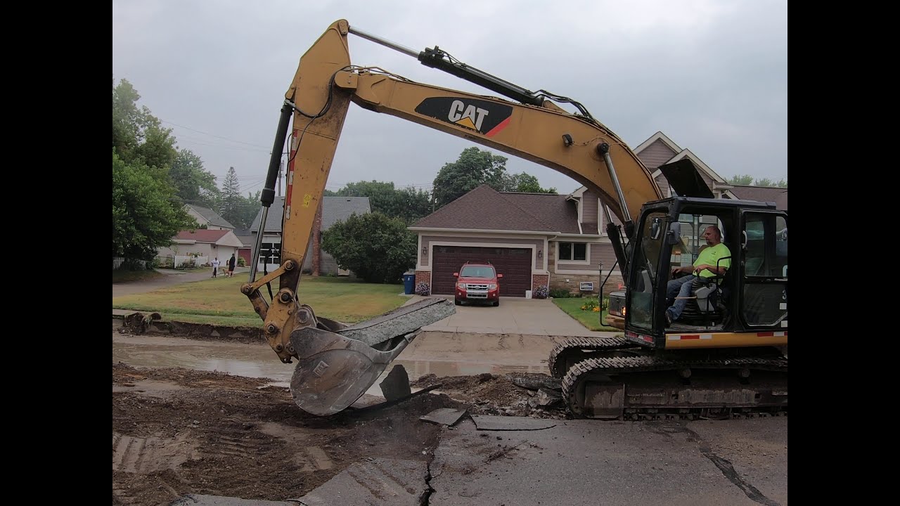 Caterpillar 320E Hydraulic Excavator at Work - Road Construction in ...