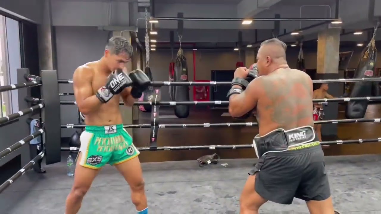 Superbon work on pad with trainer Gae