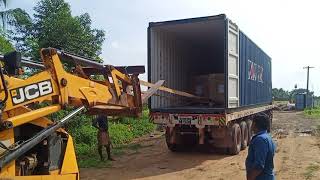 Solar Module box unloading with JCB