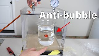 What Happens to an Anti-bubble in a Vacuum Chamber?