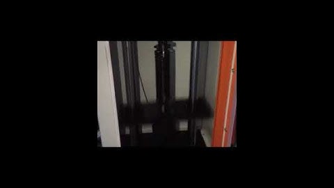 Spring fatigue testing machine