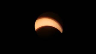 Cellphone video of telescope view of solar eclipse