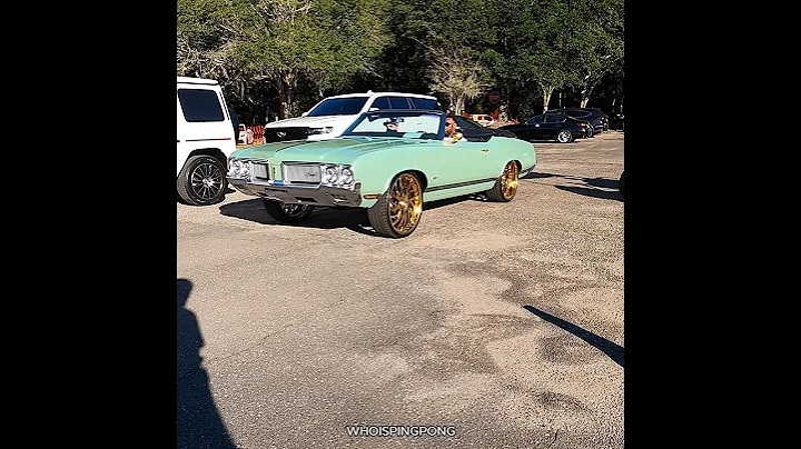 Oldsmobile cutlass supreme on gold asanti wheels