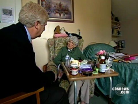 Millvina McLean is the last living survivor of the Titanic and, at 96 years old, she has been forced to auction off her valuable Titanic souvenirs to pay for her nursing home. Mark Phillips reports.