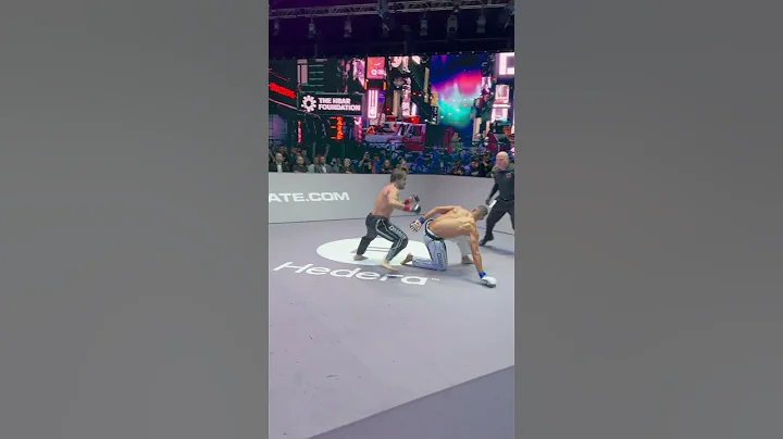 Rafael Aghayev knocks down Raymond Daniels