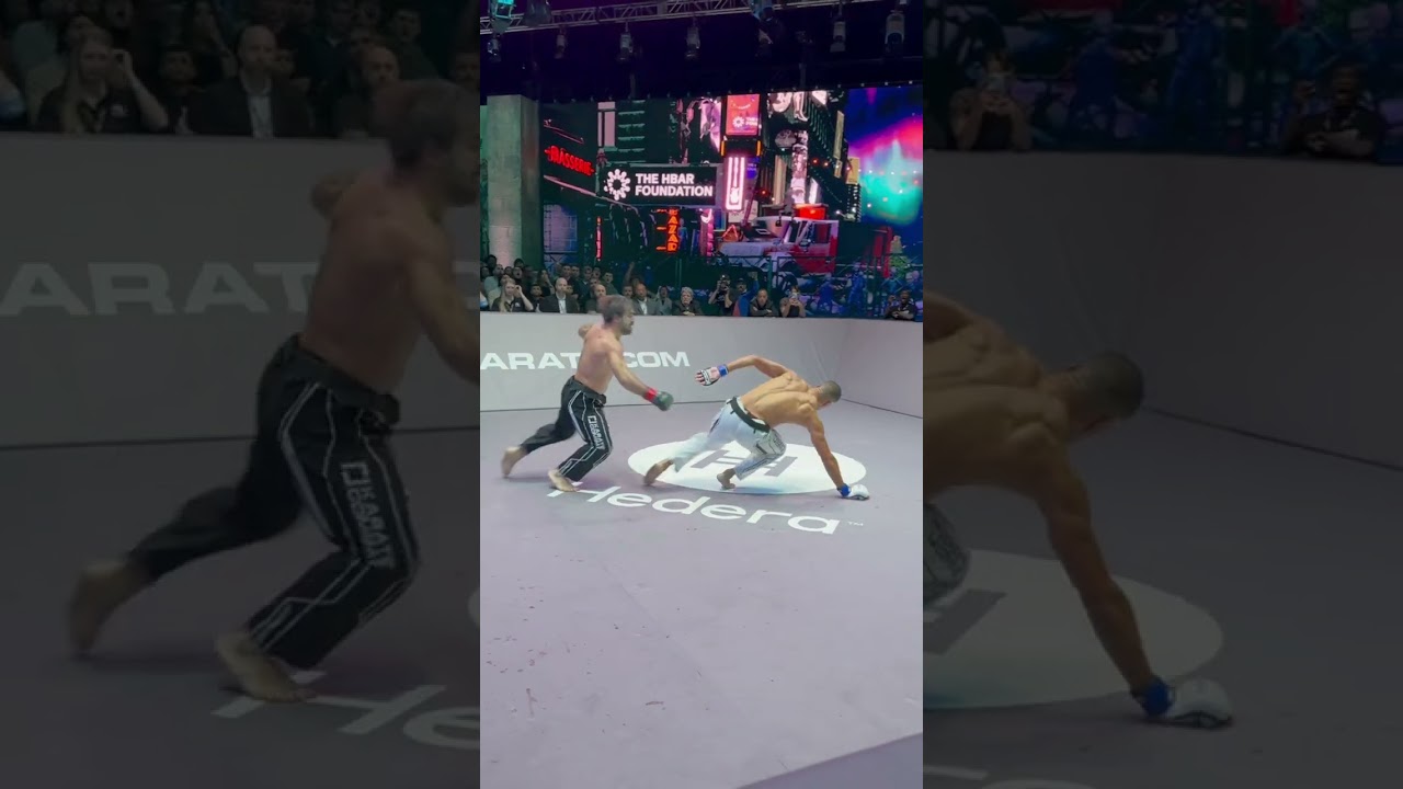 Rafael Aghayev knocks down Raymond Daniels