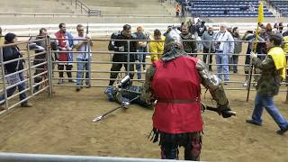 Armored knights fight to painful submission in polearm duel at international qualifier