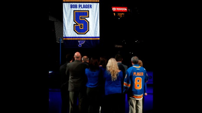 Bobby Plager watches the Blues retire his no. 5 jersey 