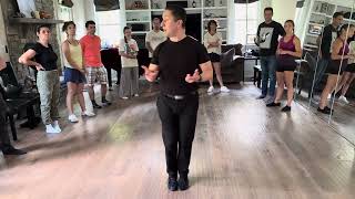 Edwin Roa explaining dance spins, July  2026