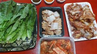 Korean Food-Pork wraps( Bossam) and Braised pork trotters(Jokbal) with kimchi