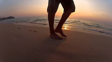 Feet Walking on Beach Sunset - Free TanuriX Stock Footage