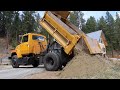 FIRST LOAD OF ROCK IN OUR NEW DUMP TRUCK