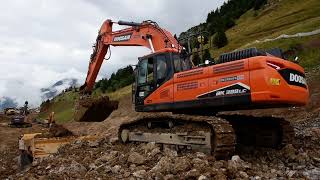 Doosan DX380-7 loading ADTs - Part 1 by Gilles Auriol - French construction machinery 7,451 views 10 months ago 7 minutes, 19 seconds